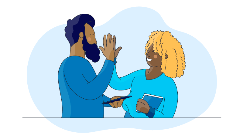 two people high fiving because they moved passed communication barriers at work 