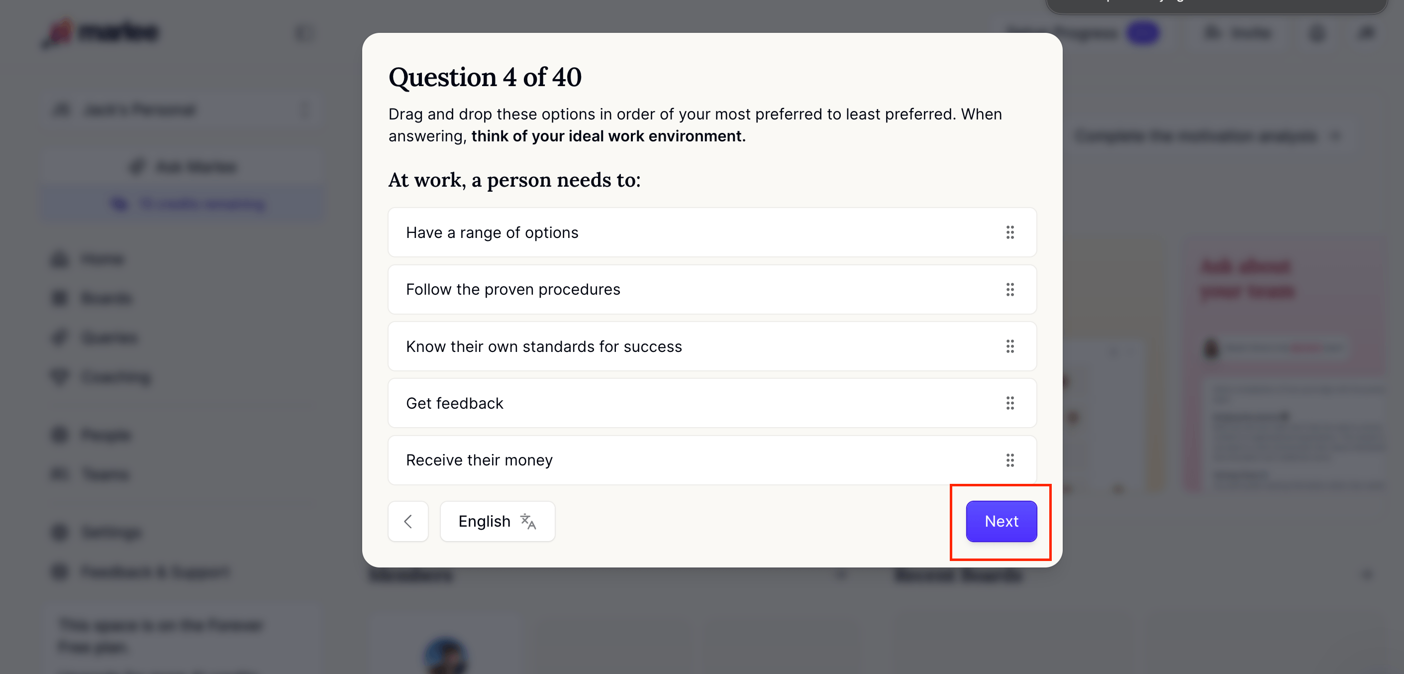 A modal screen showing “Question 4 of 40” in the Marlee motivational analysis. The instructions ask the user to drag and drop options from most preferred to least preferred, based on their ideal work environment. The question reads, “At work, a person needs to:” followed by draggable options including having a range of options, following proven procedures, knowing their own standards for success, getting feedback, and receiving their money. A language selector set to English appears at the bottom left. A purple “Next” button at the bottom right is highlighted with a red square, indicating where to click to continue to the next question.