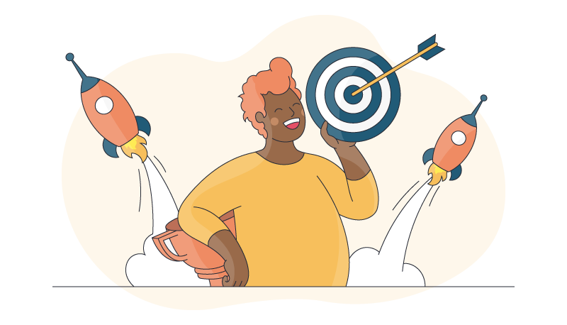 a person holds a trophy and a target with a bullseye as they set goals and succeed