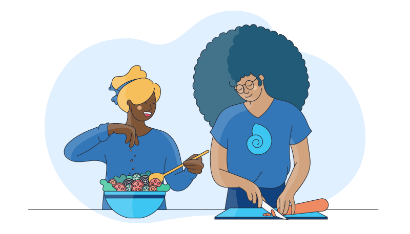 two colleagues cooking together as a employee engagement activity 